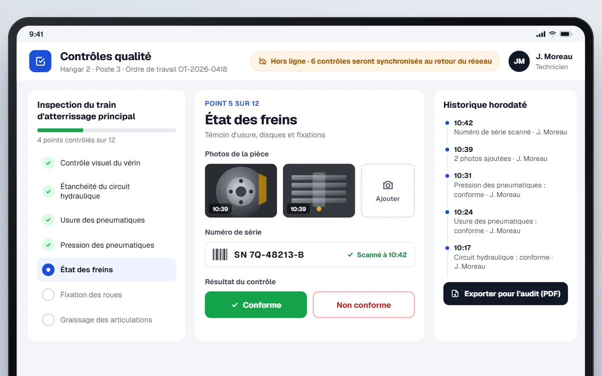 Écran tablette d'une application de contrôle qualité utilisée hors ligne : points d'inspection du train d'atterrissage, photos de pièce, numéro de série scanné et historique horodaté exportable pour l'audit