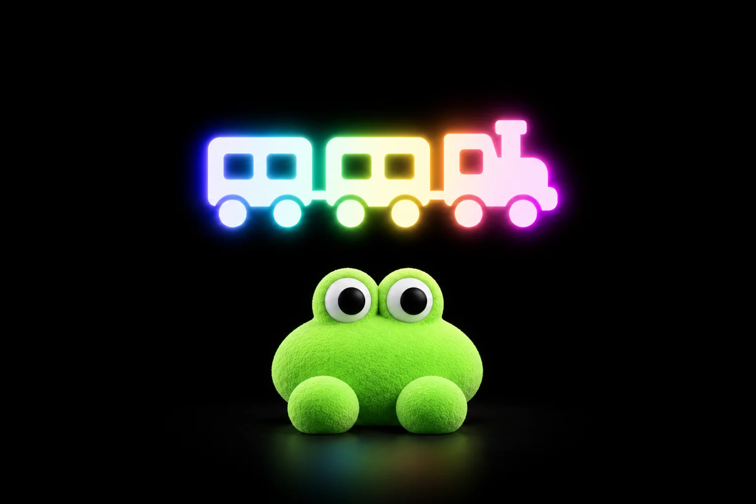 Un personnage en peluche vert aux gros yeux ronds sous un petit train lumineux
